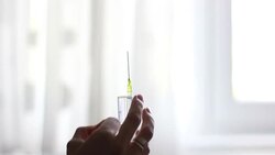 nurse using syringe Stock Footage