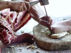 CU Shot of man carving piece of wood into mask / Ubud, Bali, Indonesia Stock Footage