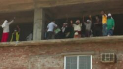 Workers protest safety conditions after building collapse kills more than 300 News Clip