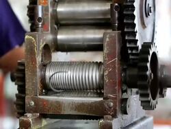 Goldsmith Jeweler rolled silver metal Stock Footage