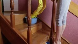 Pregnant woman washes the stairs Stock Footage