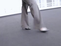  TS Businesswoman's legs as she walks through lobby of building / Seattle, Washington, United States Stock Footage