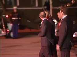 President George W Bush talks to Prince of Wales as he departs from Heathrow by helicopter Stock Footage