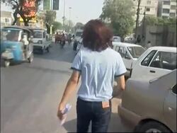 Transvestite tv presenter steals the show News Clip