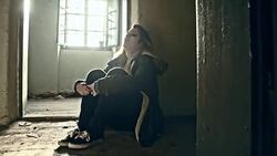 Despaired broken young woman in an abandoned house Stock Footage