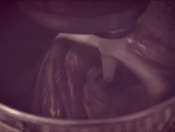 Mixing cacao and sugar with eggs Stock Footage