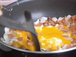 fry shallot sausage and two egg Stock Footage