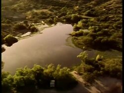Aerial over green landscape with aerial, USA Stock Footage