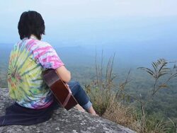 side view : man play guitar and sing Stock Footage
