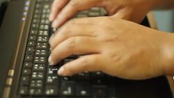 Women's hands typing on keyboard  computer Stock Footage