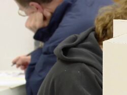 ECU, PAN, People sitting in voting booths filling in voting ballots, St. Marys, Ohio, USA Stock Footage
