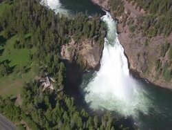 WS AERIAL View over Yellowstone Falls and roadway / Wyoming, United States Stock Footage