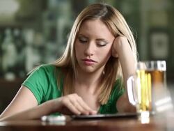 Woman with problems and beer Stock Footage