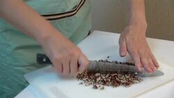 Chopping pecans Stock Footage