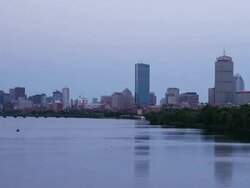 W/S Full Moon rises over Boston Downtown after dark. Zoom in Stock Footage
