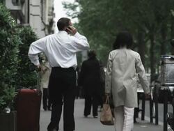 frustrated businessman talking on his cell phone Stock Footage