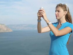 Girl with a mobile phone Stock Footage