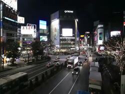 MS Cars passing through street at night / Shibuya, Tokyo, Japan Stock Footage