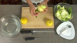 Overhead preparation of an artichoke for a food recipe. Stock Footage