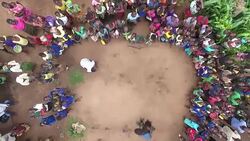 Drone aerials of a traditional fertility dance News Clip