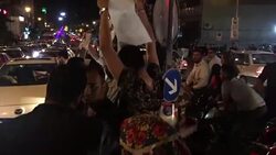 CLEAN : Iranians take to streets on final day of election campaigning News Clip