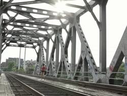WS Two young girls running and exercising together on railway track / Minneapolis, Minnesota, United States Stock Footage