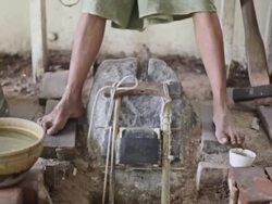 MS R/F View of Hammer falling on gold in order to make gold leaves  / Mandalay, Mandalay Division, Myanmar Stock Footage