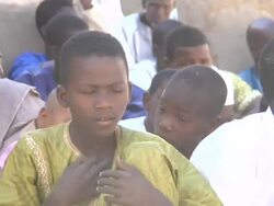 Muslim boy at prayer Stock Footage