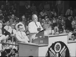 1948: DEMOCRATIC NATIONAL CONVENTION: President Harry S Truman behind podium saying 80th Congress trying to dodge responsibilities, not going to let them, country can't afford another Republican Congress, Truman walking away, WS Delegates on floor. Instructional Video