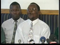 Anti-Powell demo/embassy victims demand more compensation. News Clip