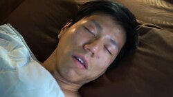 2 Shots Asian Man sleeping and snoring Stock Footage