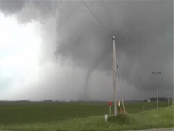 Slender elephant trunk tornado forms then dissapates close by, WA, USA Stock Footage