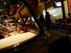 MS PAN Shot of Japanese restaurant, Sushi prepared inside VW bus / Sao Paulo, Brazil  Stock Footage