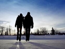 Young love flourishes while skating Stock Footage