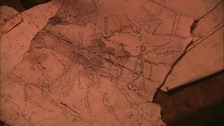 A pioneer moves a map on a table. Stock Footage