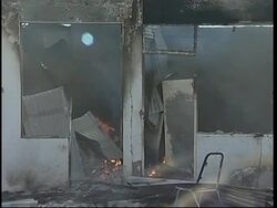 Australian troops, burning houses, angry crowds, govt crisis mtgs News Clip