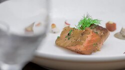 A fork slowly cuts into a delicious meal Stock Footage