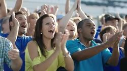 Stadium crowd cheers at sporting event Stock Footage