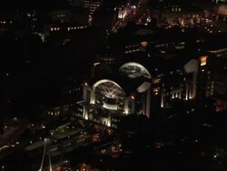 Aerial wide shot Charing Cross railway station and surrounding area at night / London, England Stock Footage