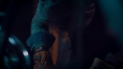 Man in motorcycle workshop grinding a piece of metal Stock Footage