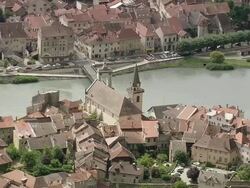 MS AERIAL Shot of river with bridge at Seyssel city / Rhone Alpes, France Stock Footage