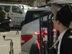 Detectives examine evidence outside synagogue News Clip