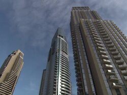 LA Skyscrapers in the city skyline surrounded by blue skies / Dubai, United Arab Emirates Stock Footage