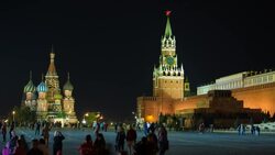 St Basils Cathedral and the Kremlin in Red Square, illuminated at night, Moscow, Russia - Time lapse Stock Footage