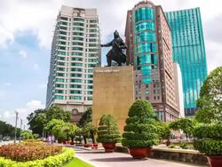 WS T/L TU View of roundabout in front of Renaissance Riverside Hotel / Ho Chi Minh City, Southeastern, Vietnam Stock Footage