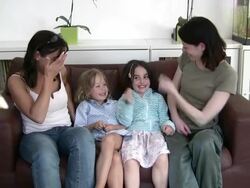 Two moms playing with kids Stock Footage