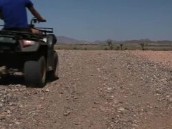 Good Looking Young Couple ride Quad Bike Stock Footage