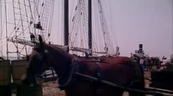 Workers by a ship in the harbour, 1908 - reenactment Stock Footage