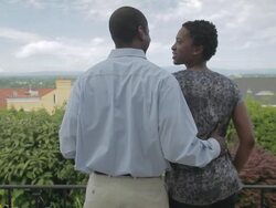 MS Couple sharing romantic moment on balcony  / Portland, Oregon, United States   Stock Footage