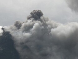 Ash cloud erupts from Merapi volcano; Central Java, Indonesia. 29 October 2010 Stock Footage